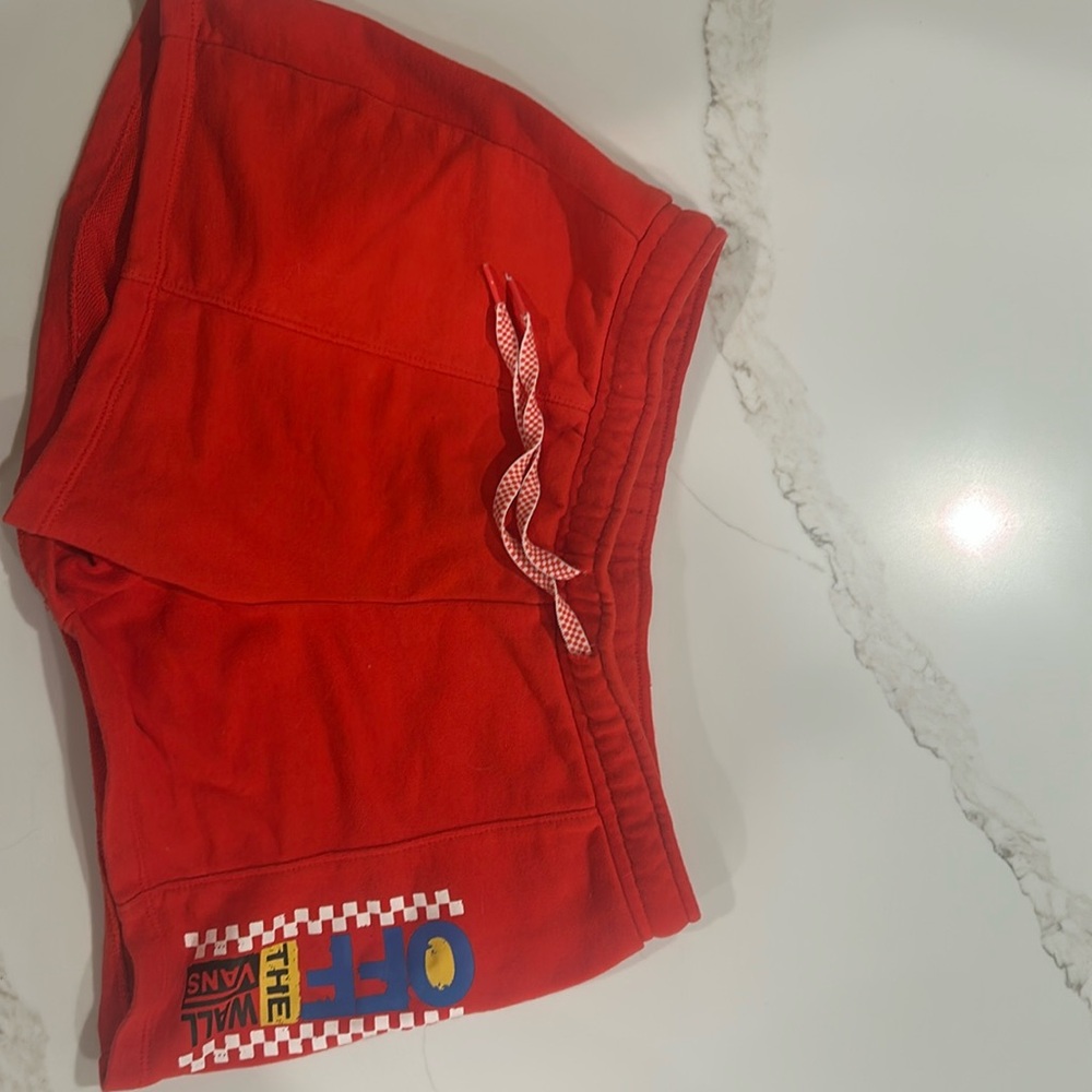 Off the wall vans red short shorts used good condition. Size small.